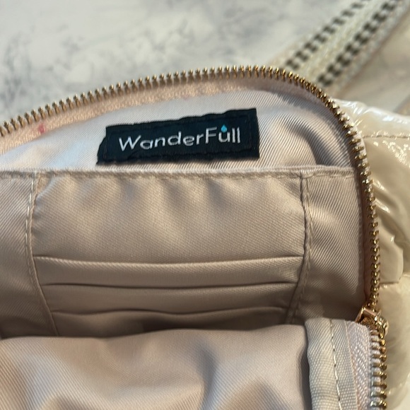 Has many compartments and adjustable straps used just a few times this summer - Picture 3 of 7